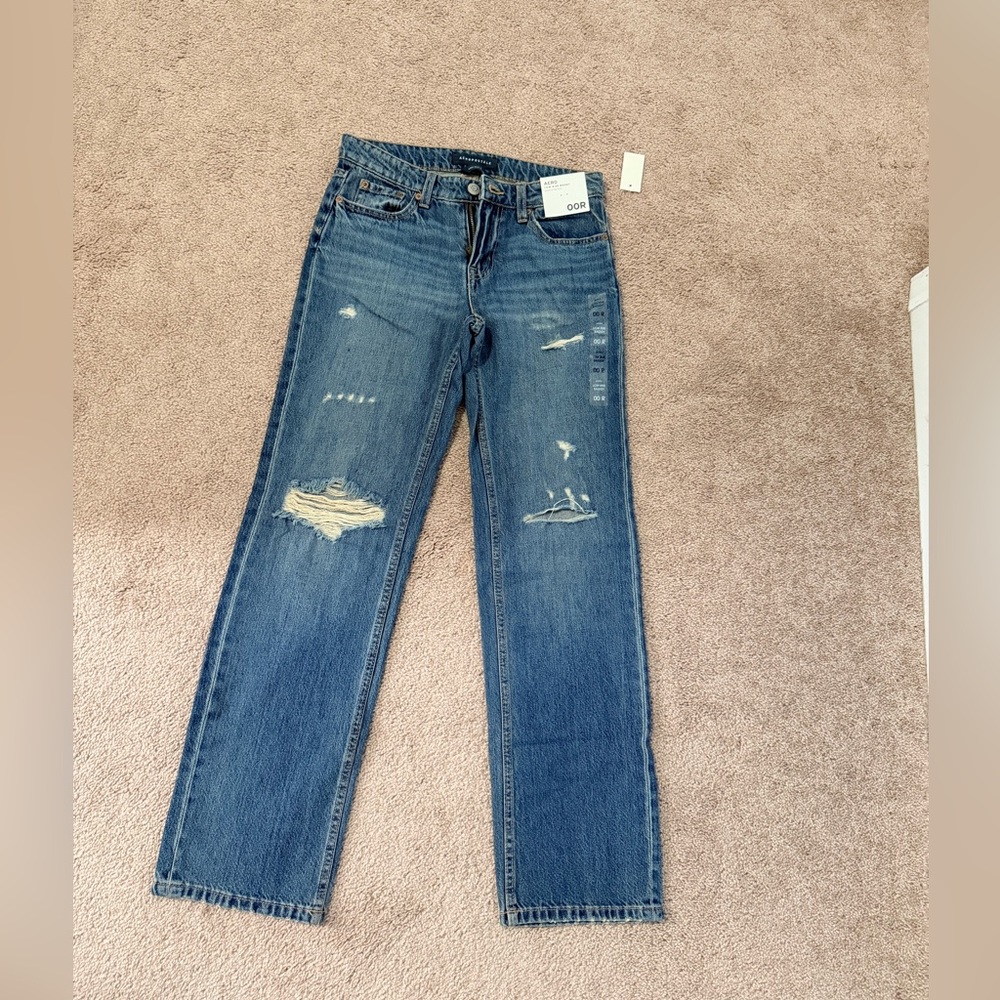 Distressed Blue Jeans